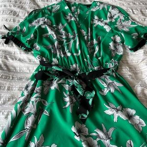 Lame Bryant black and green floral mock wrap dress.